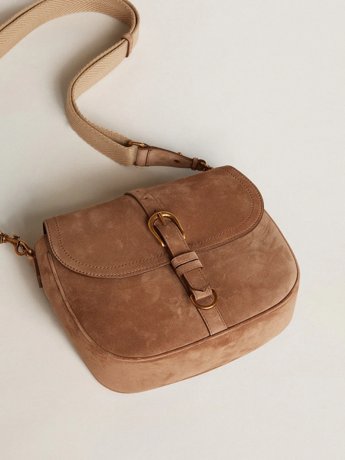 Medium Sally Bag in ash-colored suede with contrasting buckle and shoulder strap